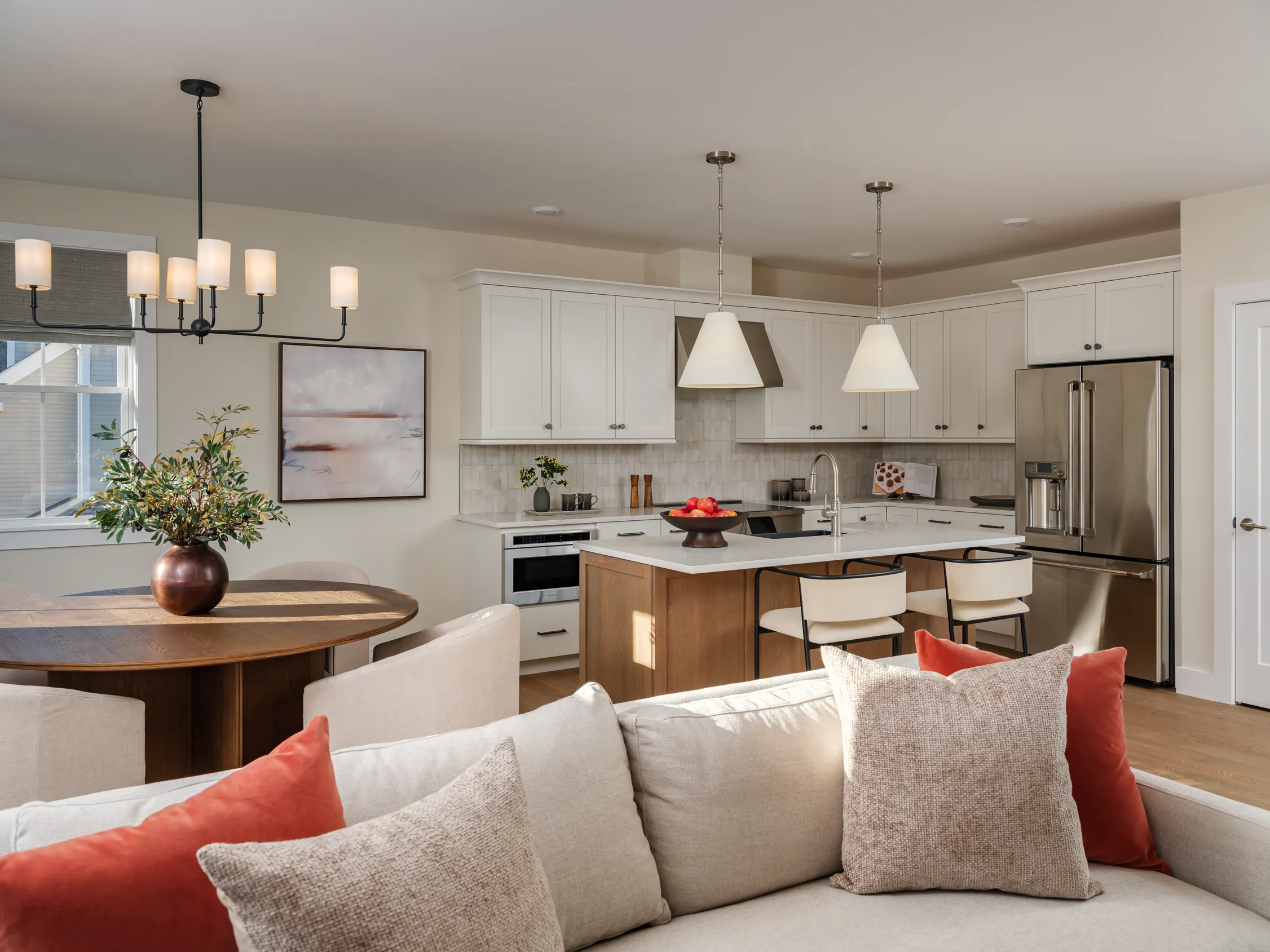 Open-concept kitchen and living area in the Pine at Alden's Reach in Plymouth MA