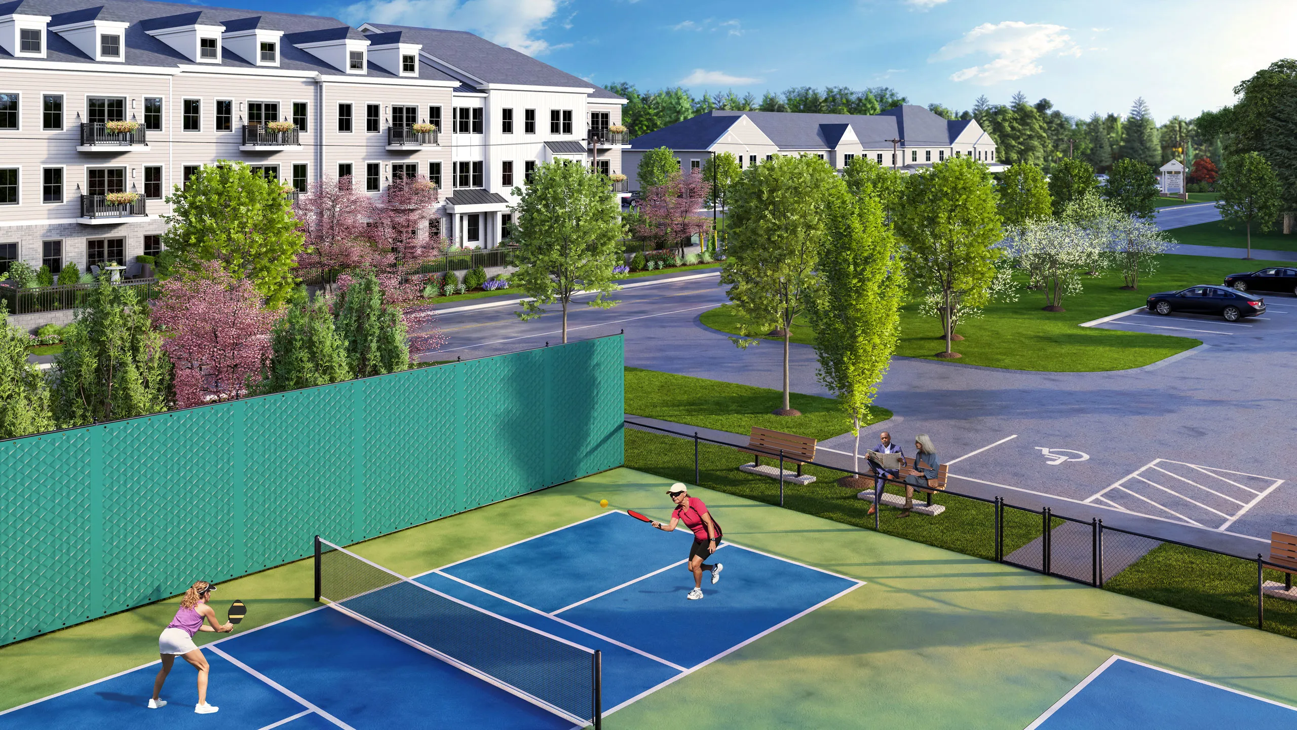 Pickleball courts looking toward Building 1 at Featherwinds in Halifax MA