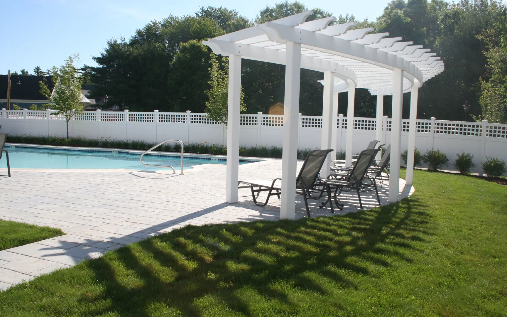 Pergola and community pool at Red Mill Village, NAHB award-winning neighborhood in Norton MA