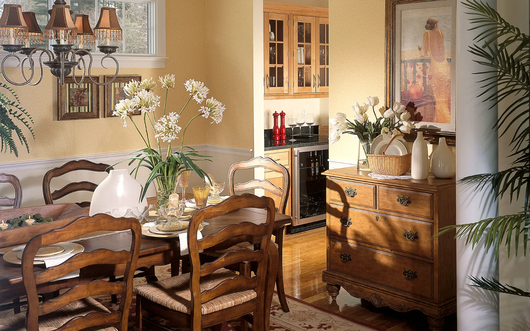 Formal dining area with china cabinet at Red Mill Village, award-winning homes in Norton MA