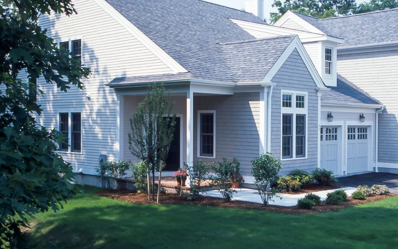 Private rear yard with raised beds at a GreatBrook attached home in Norton Massachusetts