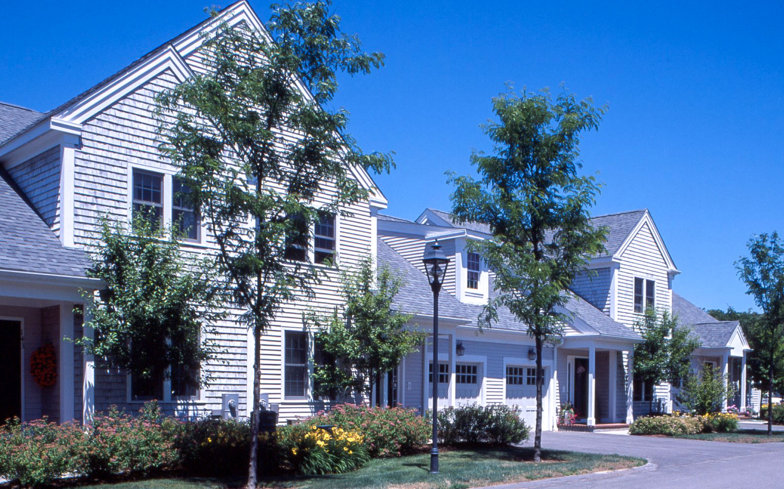 GreatBrook active adult attached homes with New England architecture in Norton MA