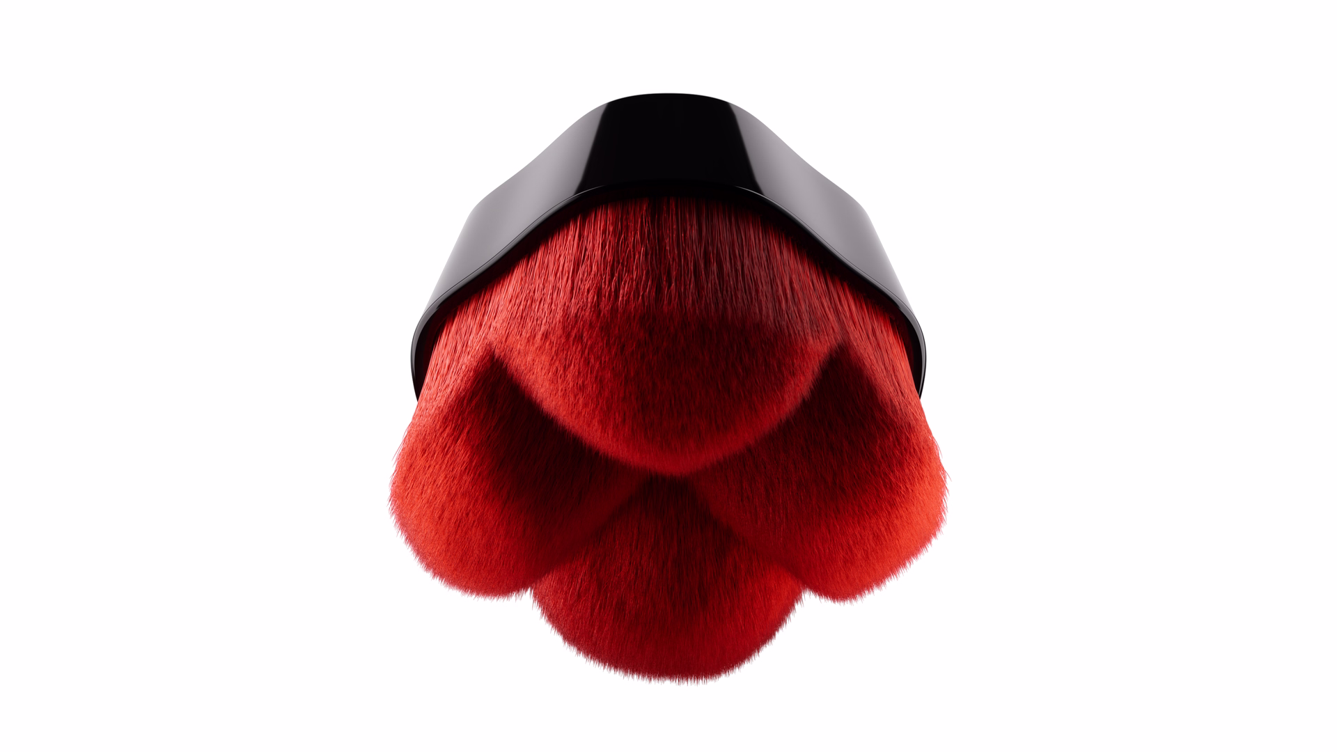 Close-up of a red makeup brush with dense, soft bristles and a shiny black ferrule.