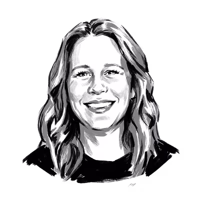 Black and white watercolor portrait of a smiling woman with long wavy hair.
