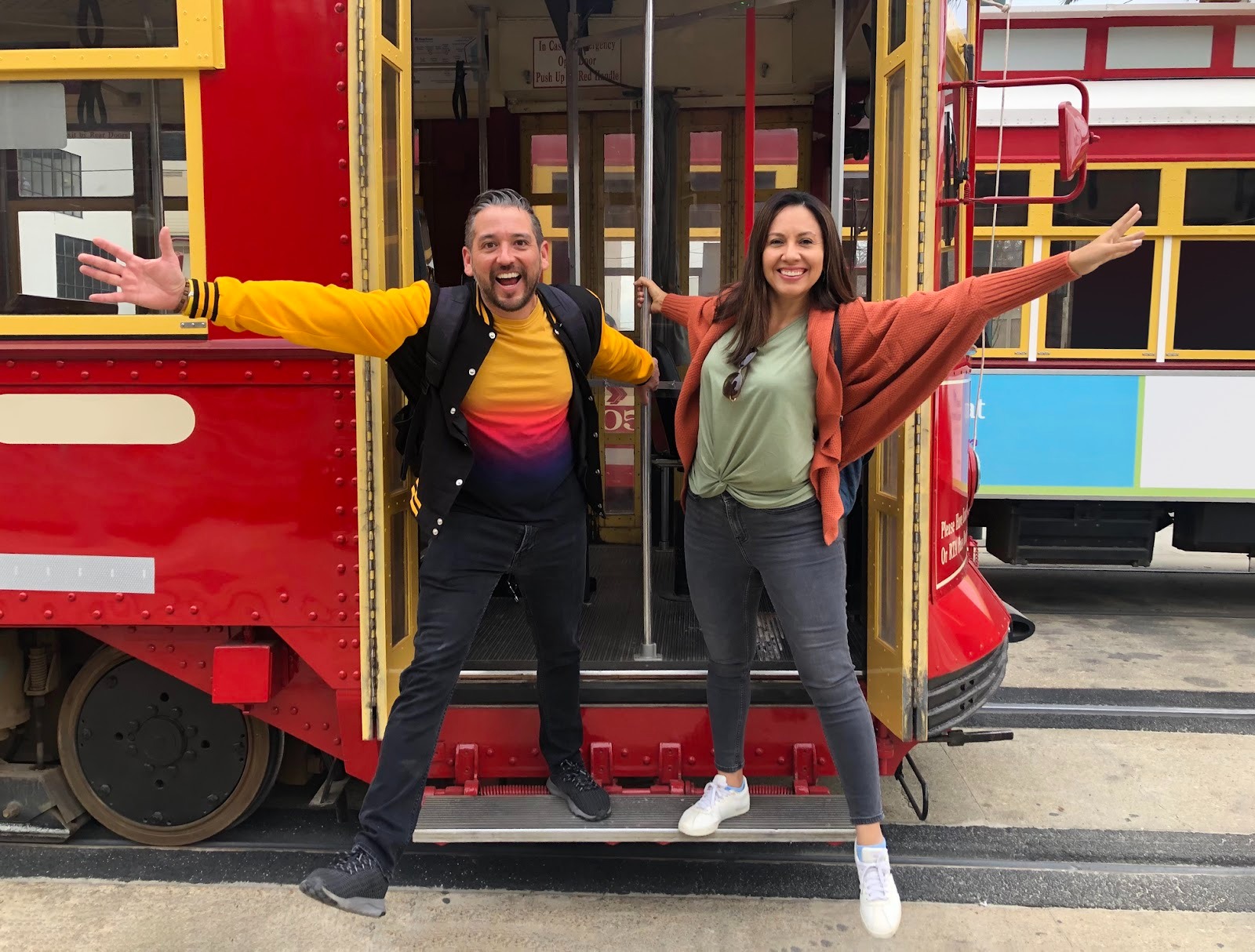two people on public trolley in new orleans
