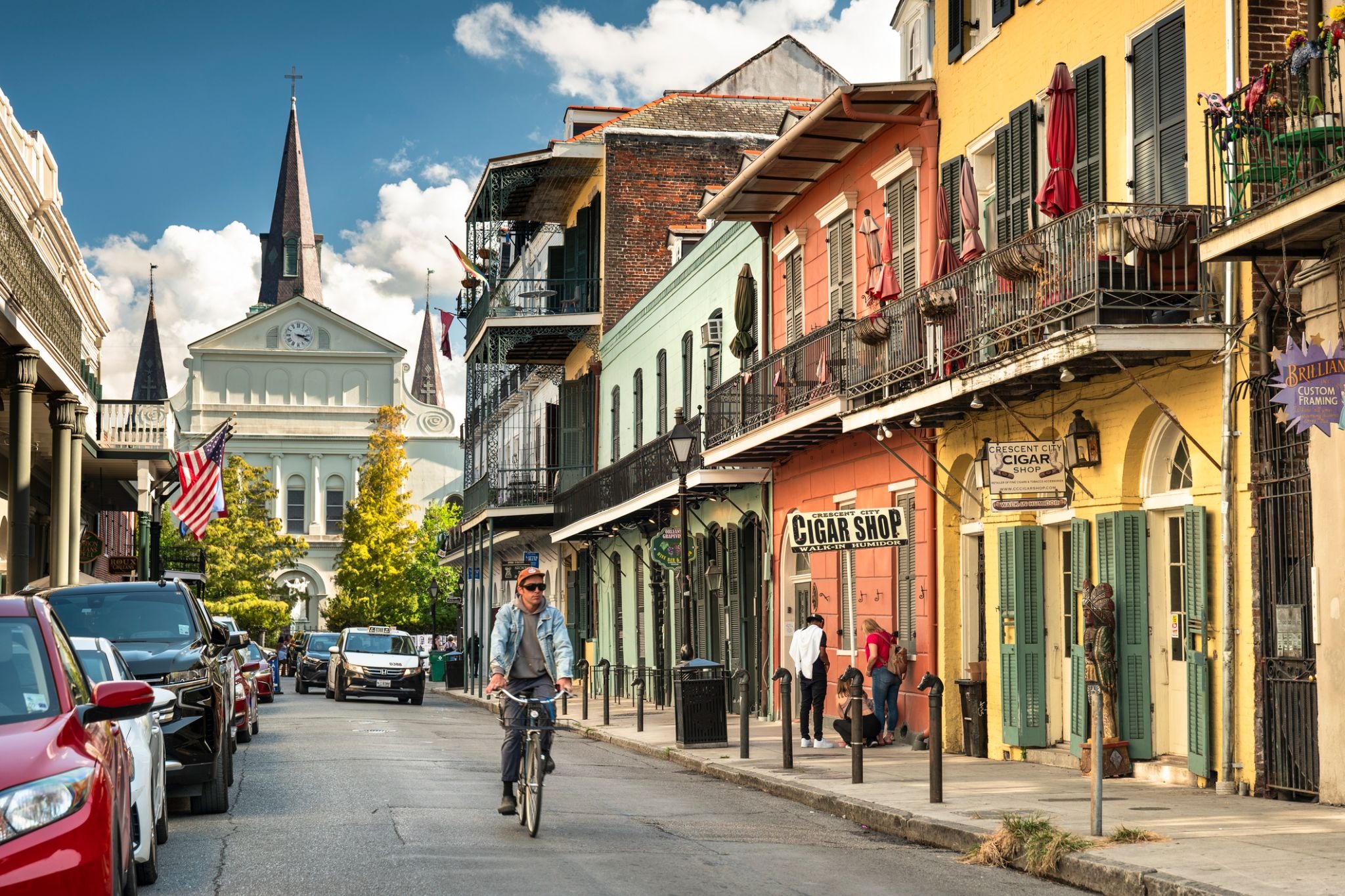 street of new orleans with bicyclist