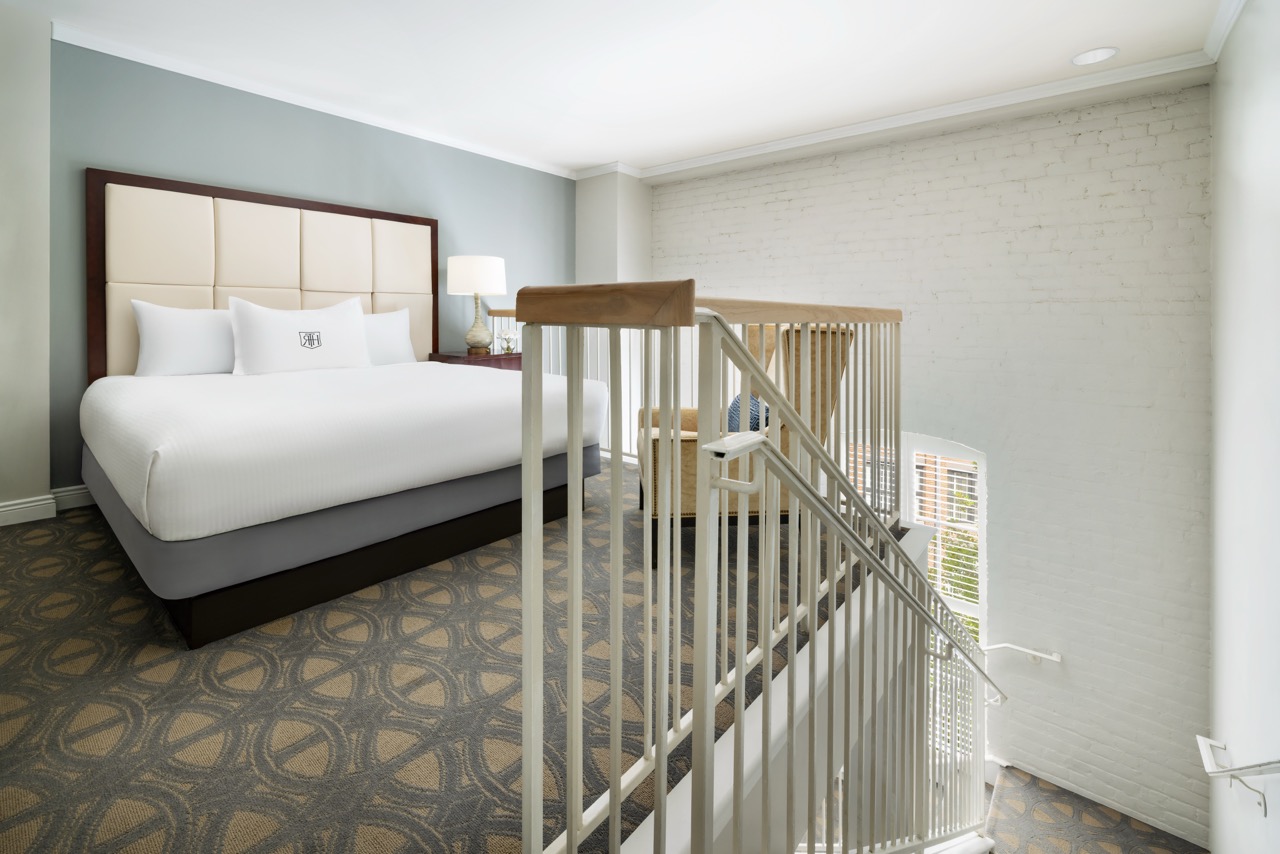 Executive Hospitality Loft Suite second level bedroom