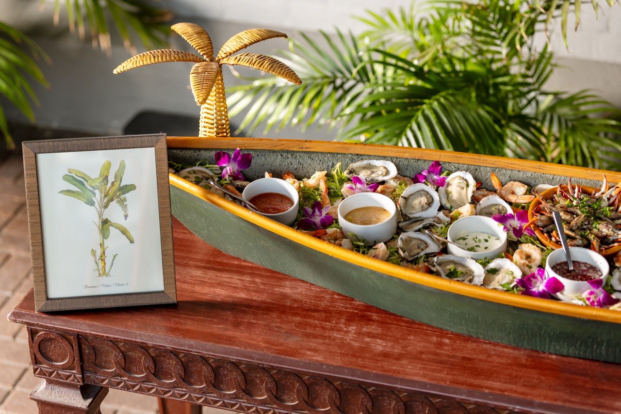 Seafood Banquet in wooden boat on table