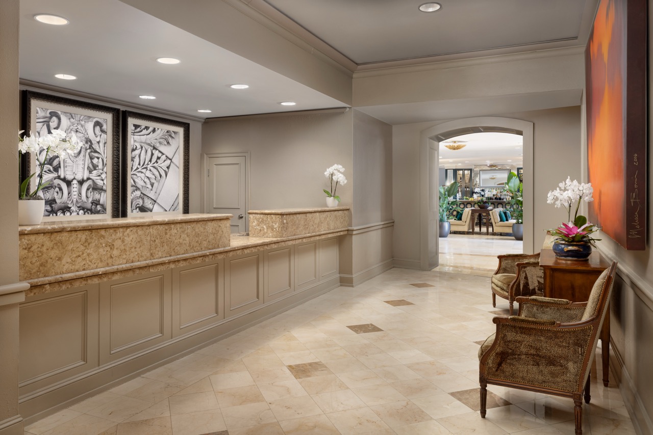 Front Desk with seating and artwork