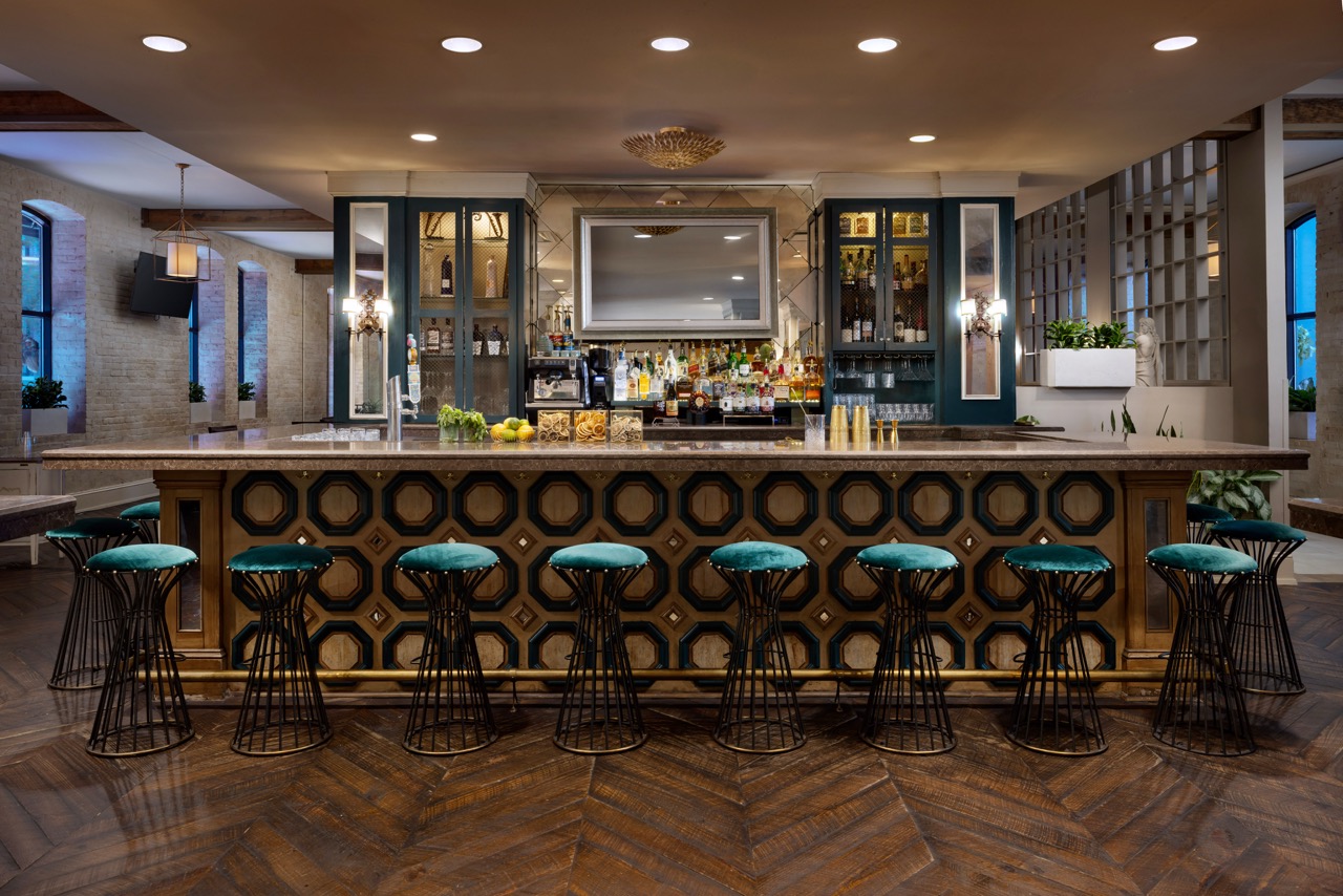 Riverfront Bar At Night with rows of bar seating
