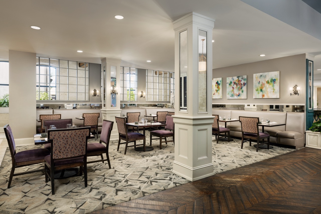 Riverfront Dining Room with artwork on walls