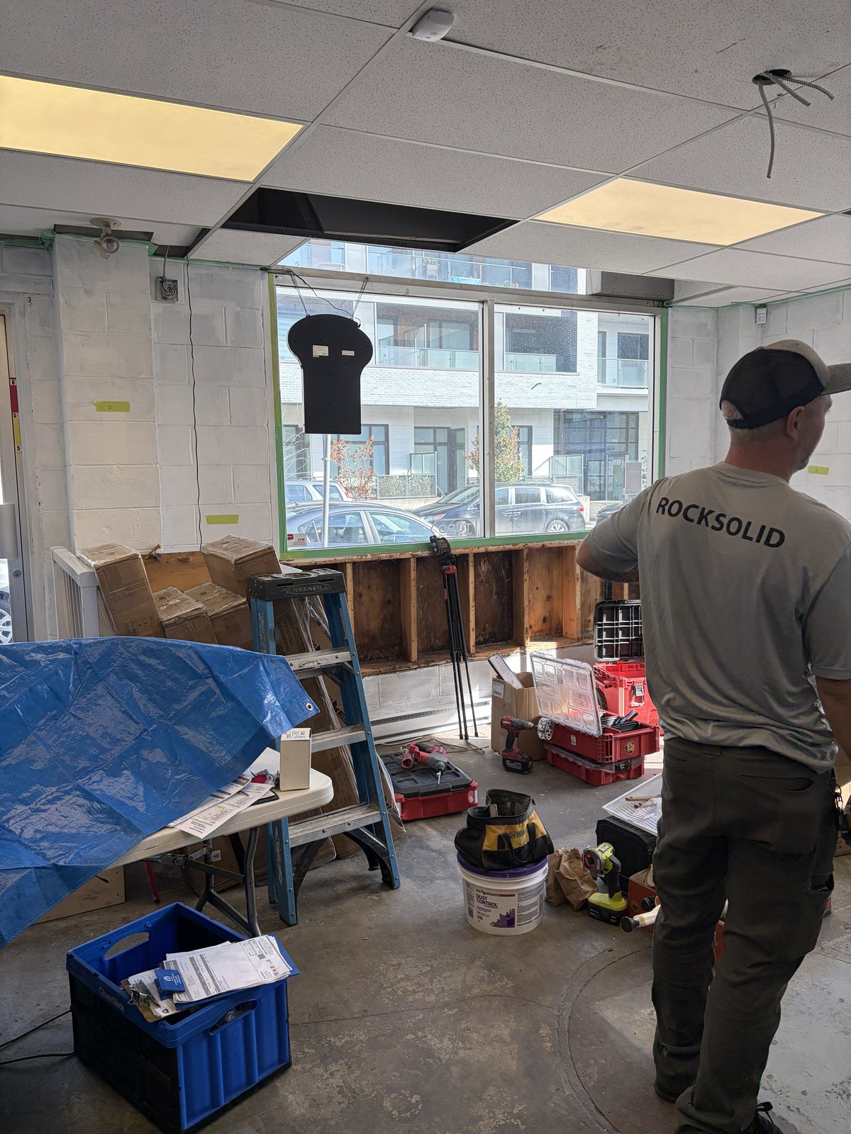 Front window wall being reframed during the shop renovation