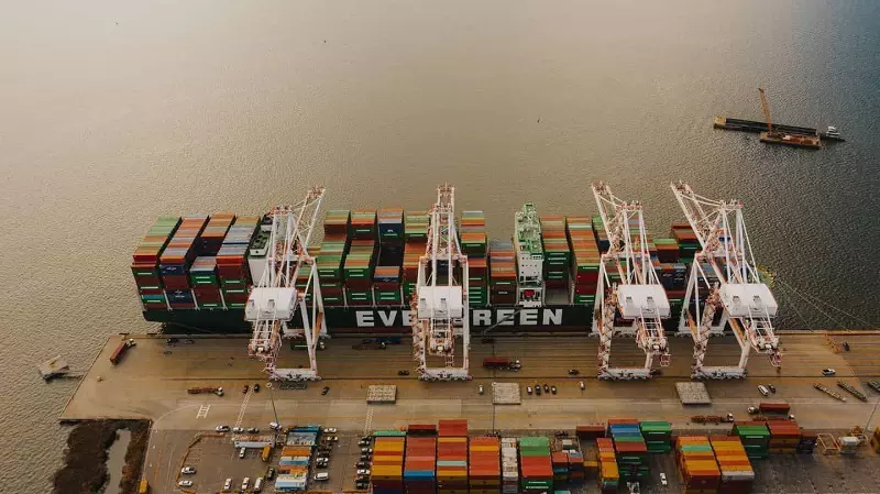 Ship with contaiers is waiting to get unloaded.