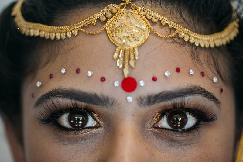 A women wearng Bindi.