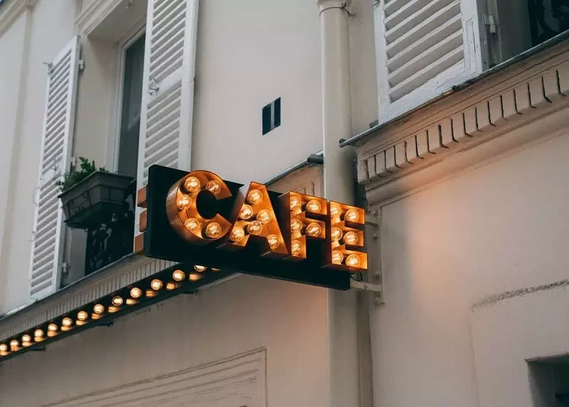 Cafe name displayed with lighting.