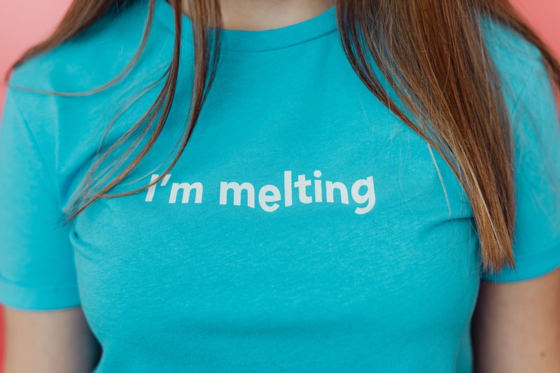 A lady wears blue printed t-shirt 