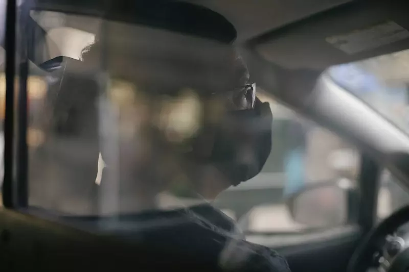 A lady is driving car