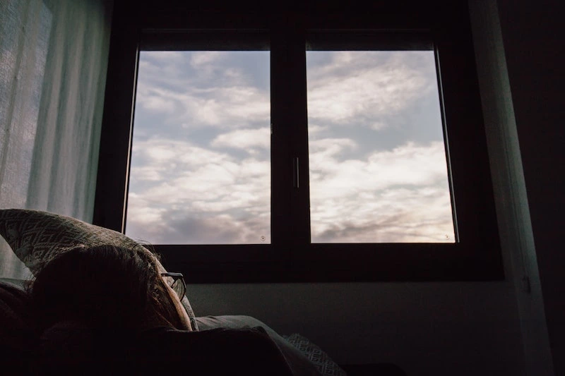 A cloud is seen outside the window