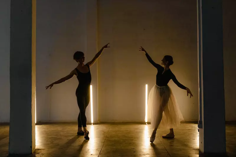Two Dancers dancing at a ballet studio