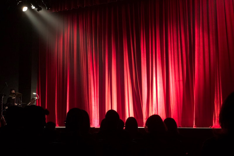 Stage with red curtains.