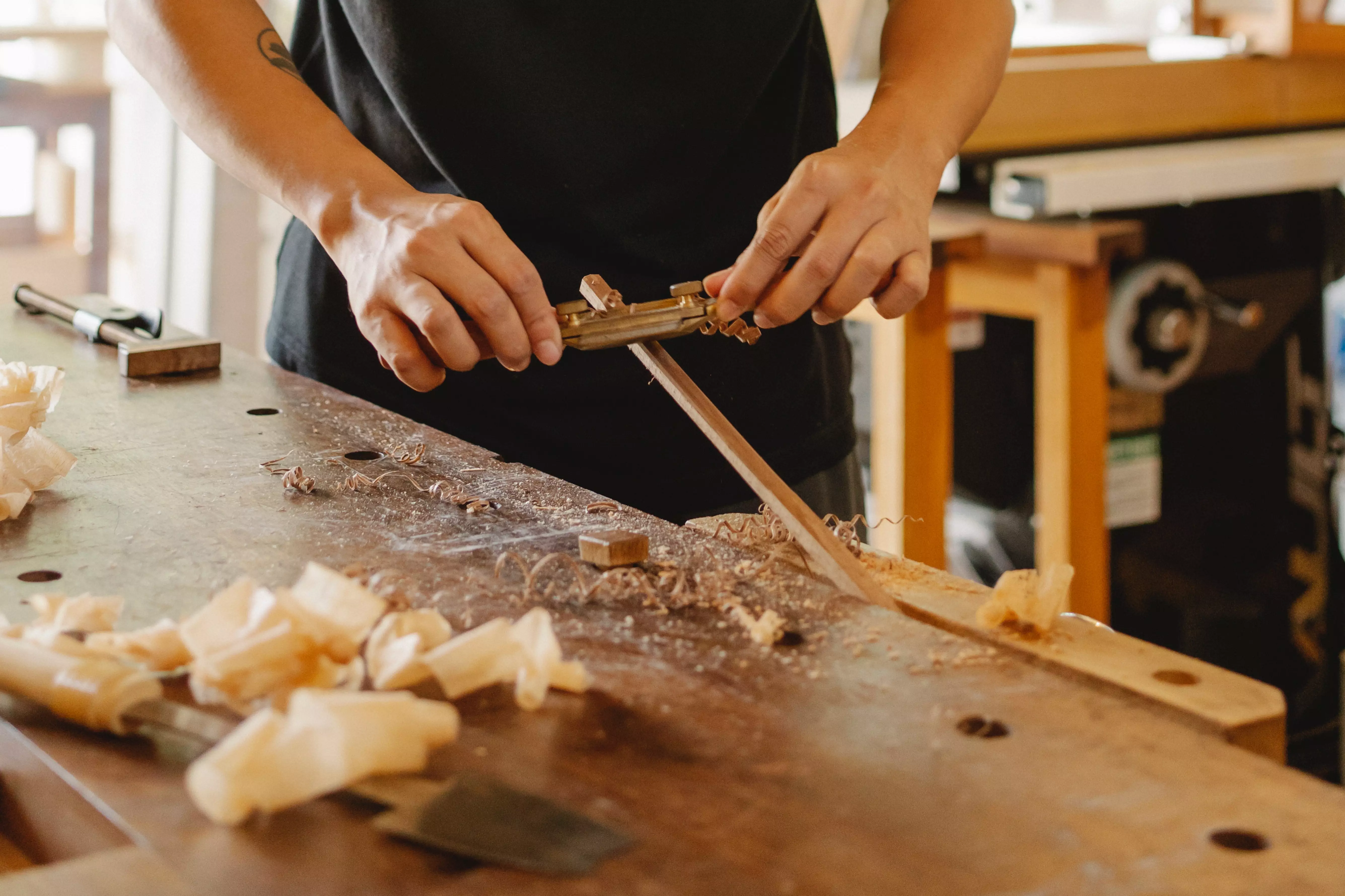 A man is peeling the stick