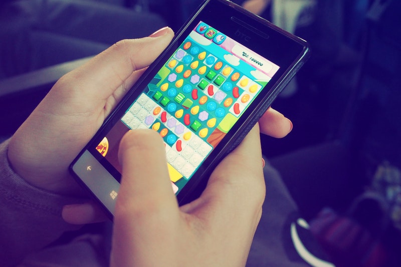 Someone is playing game in the phone.