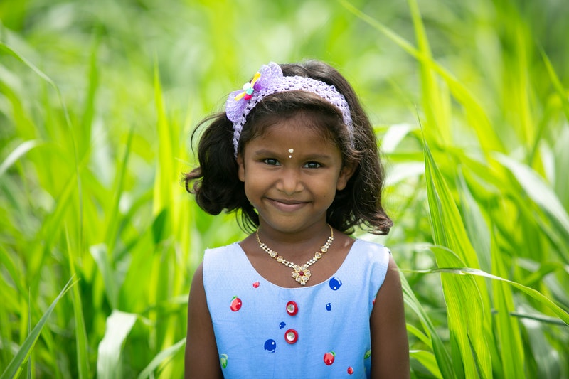 A girl wearing hair band.