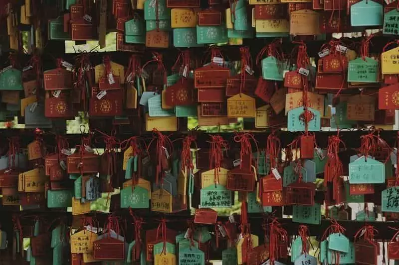 Different coloured nameplates hanged on each other.