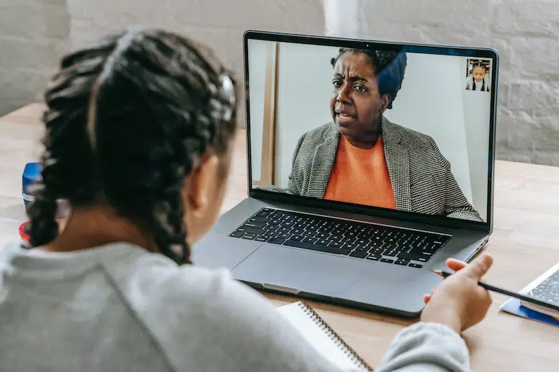 A girl taking online by laptop 
