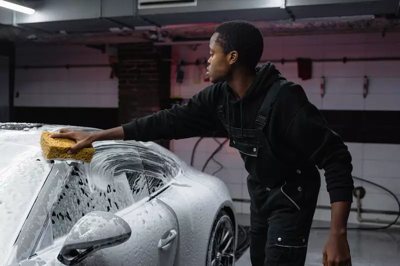 A man is washing car