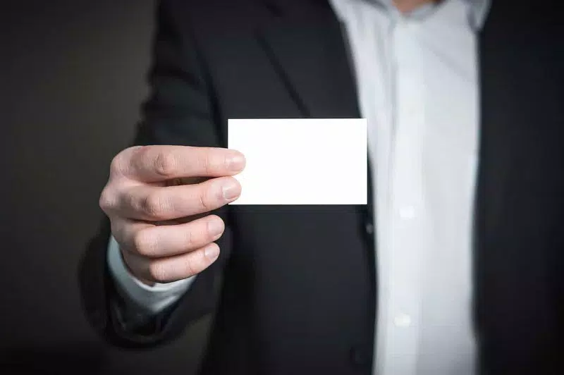 A man holding a card 