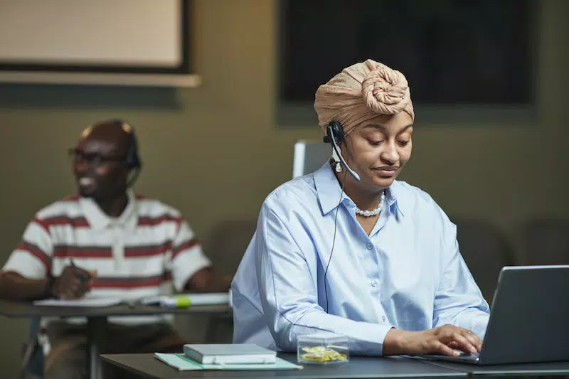 a lady on the service center using laptop