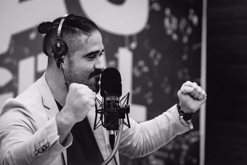 A man singing on the mic