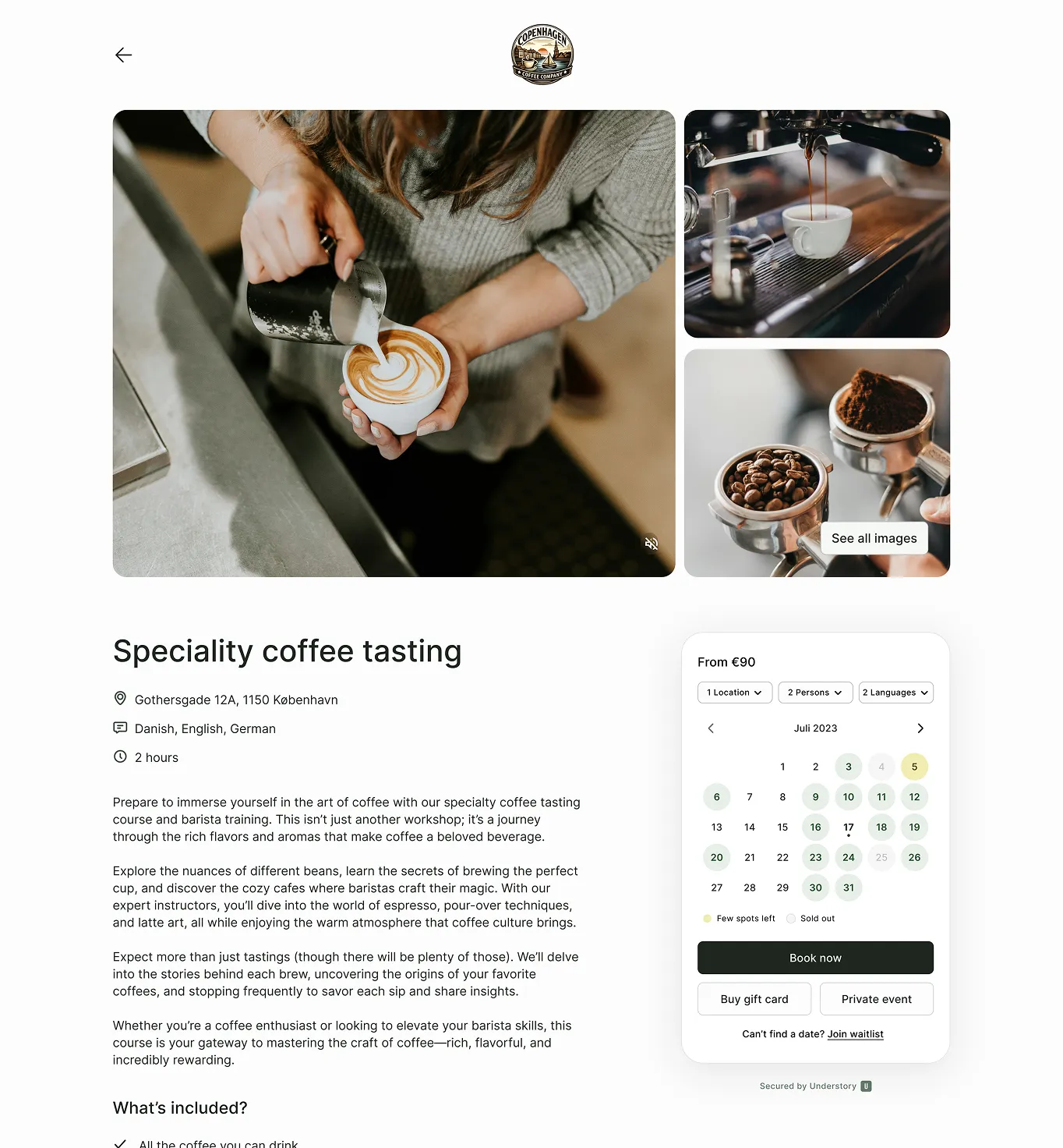 Person pouring milk into a cup of latte with coffee machine espresso shots and portafilters with coffee beans and grounds on the side.