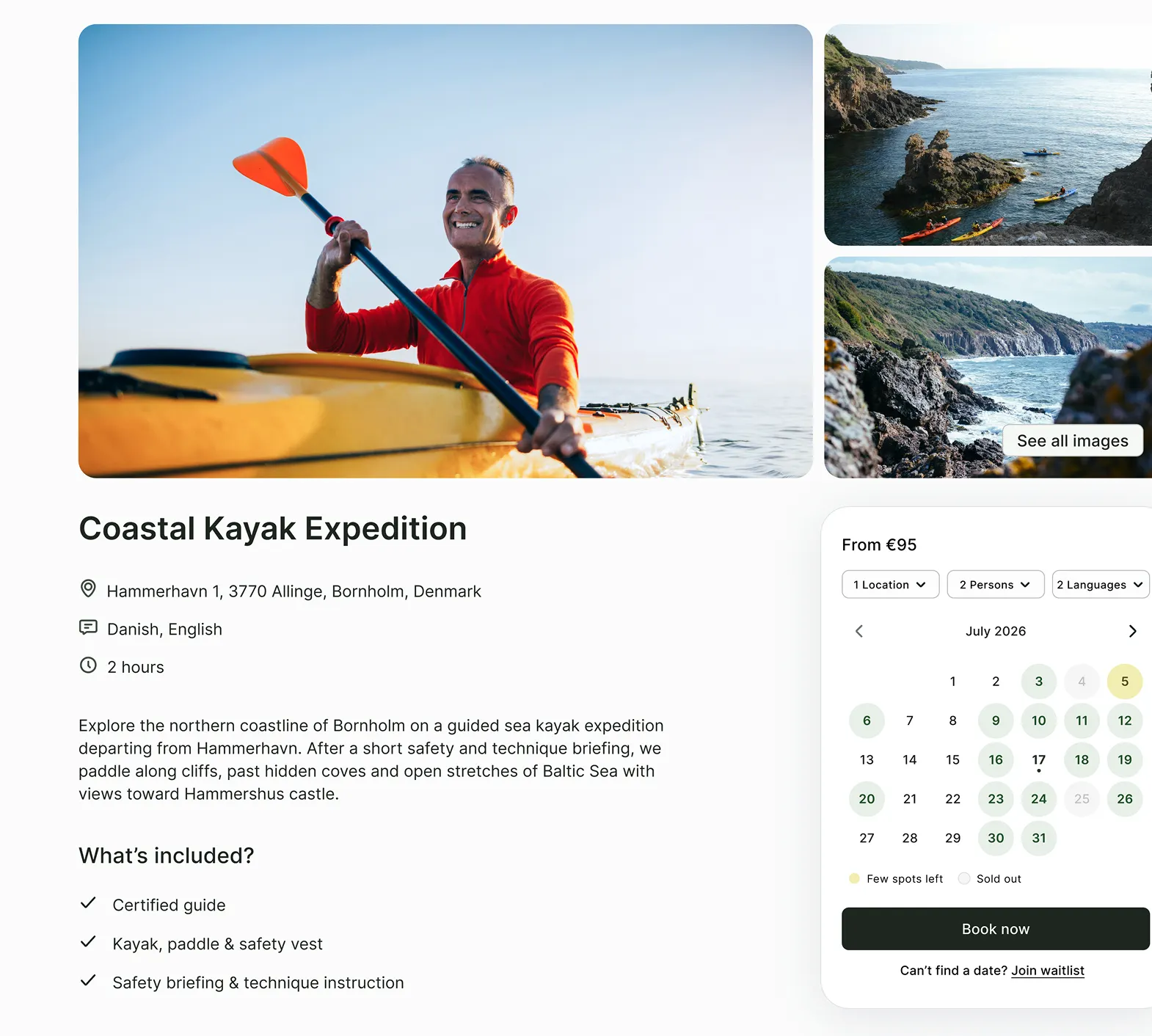 Smiling man in a red jacket paddling a yellow kayak on calm water under a clear sky.