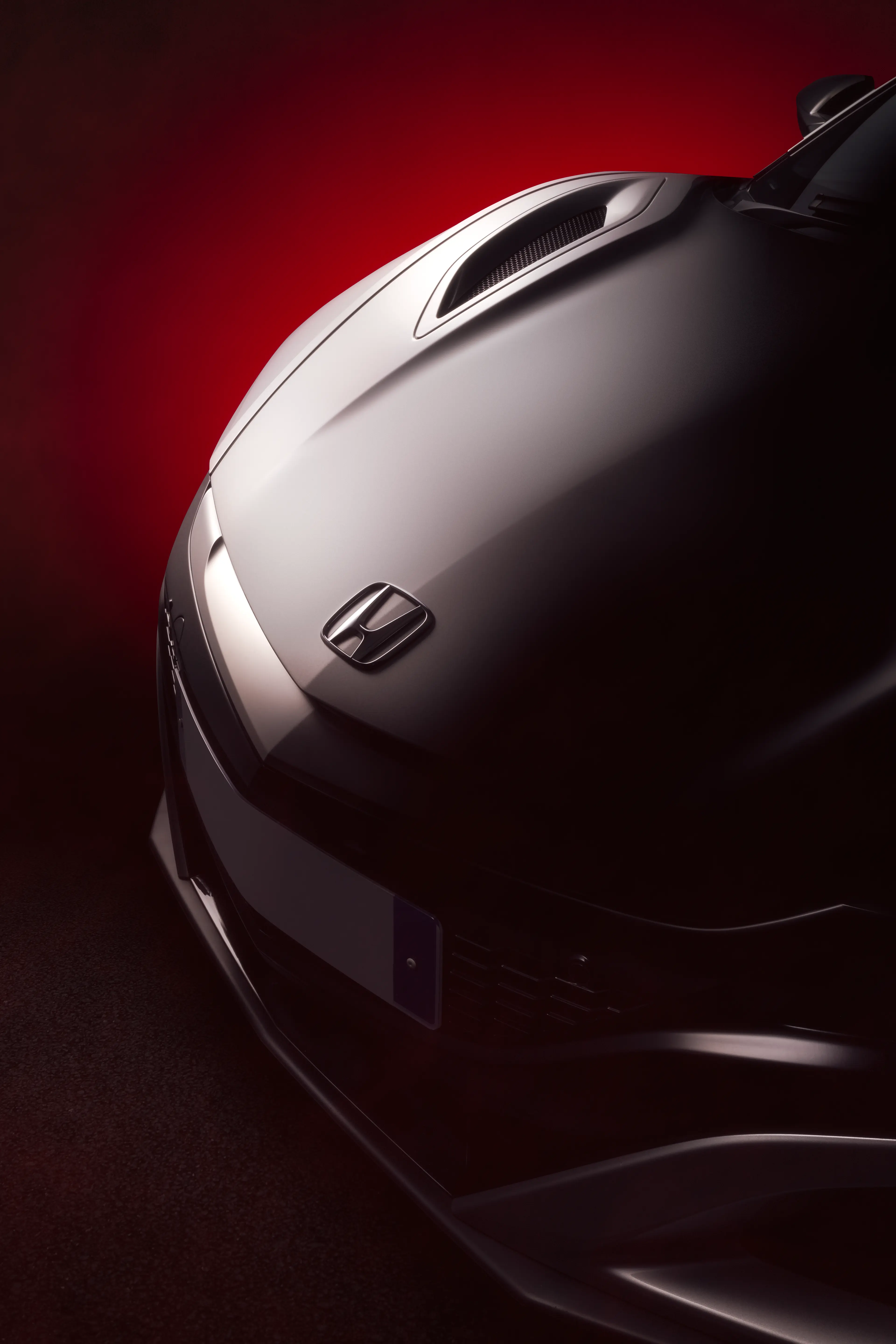 Capot avant d'une Honda NSX (NC1) grise avec la technique FDL