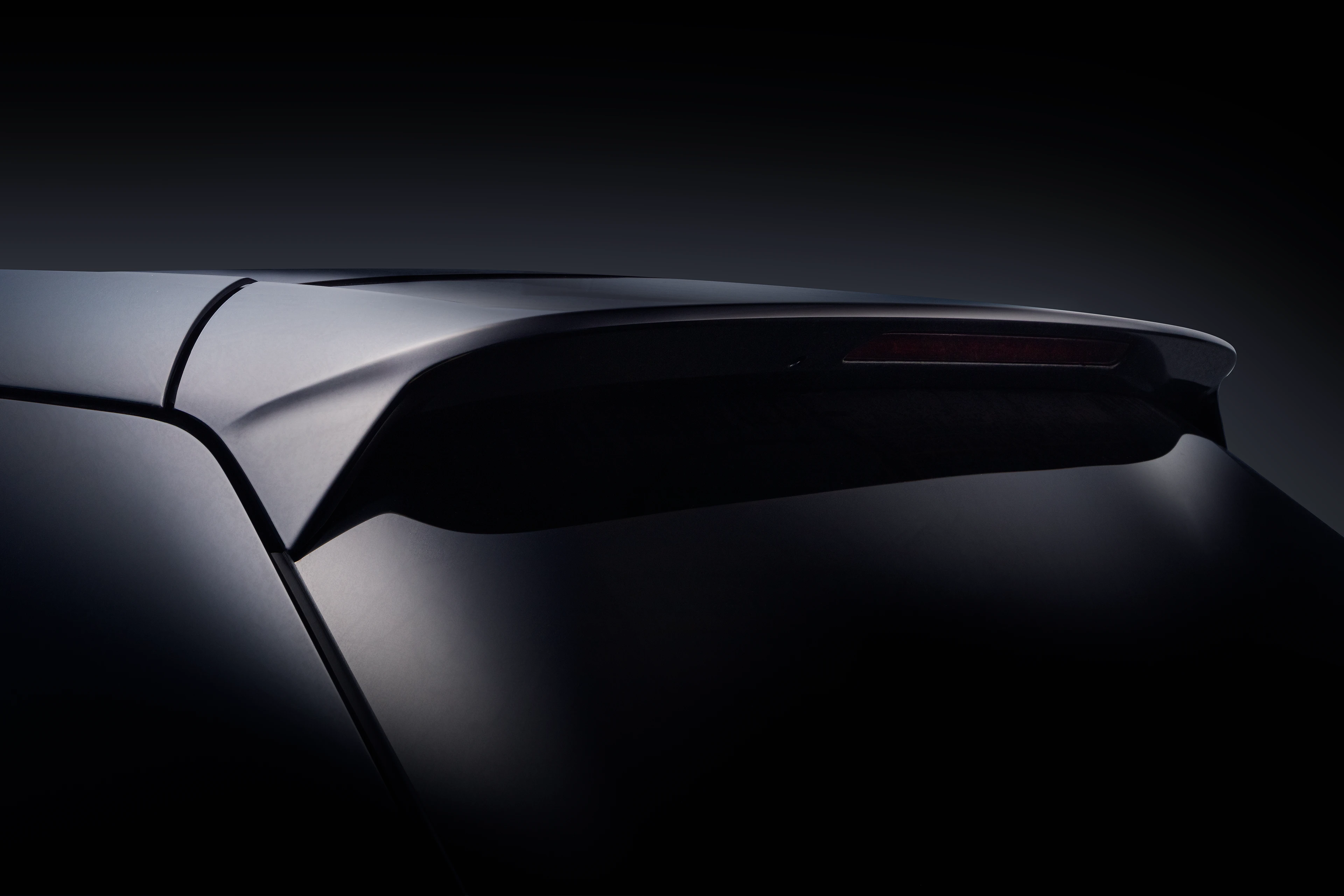 Becquet arrière d'une Honda E noire avec la technique FDL