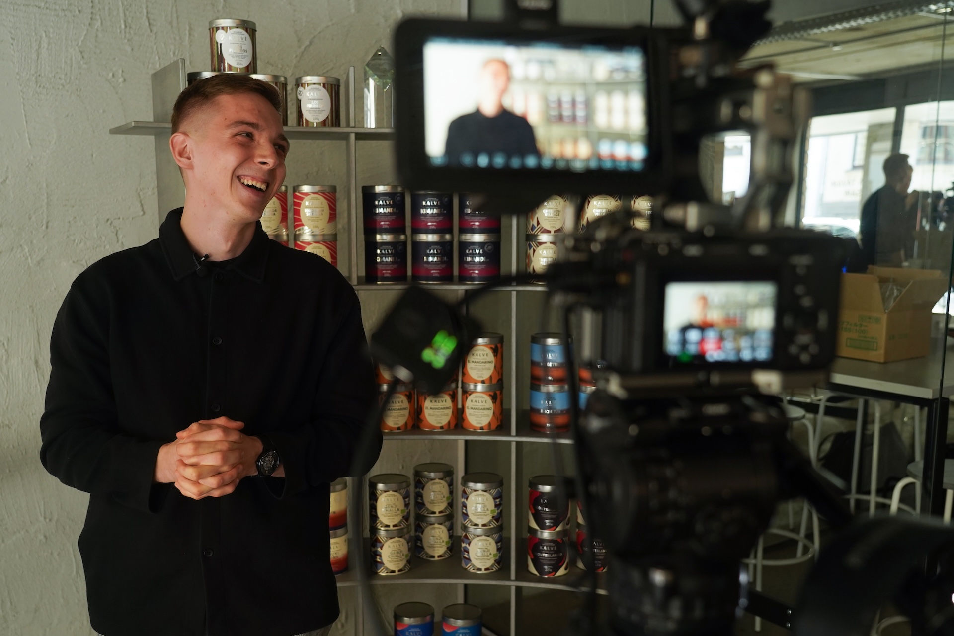 Kalve Coffee's Head of Commerce, Nauris, giving a video interview.