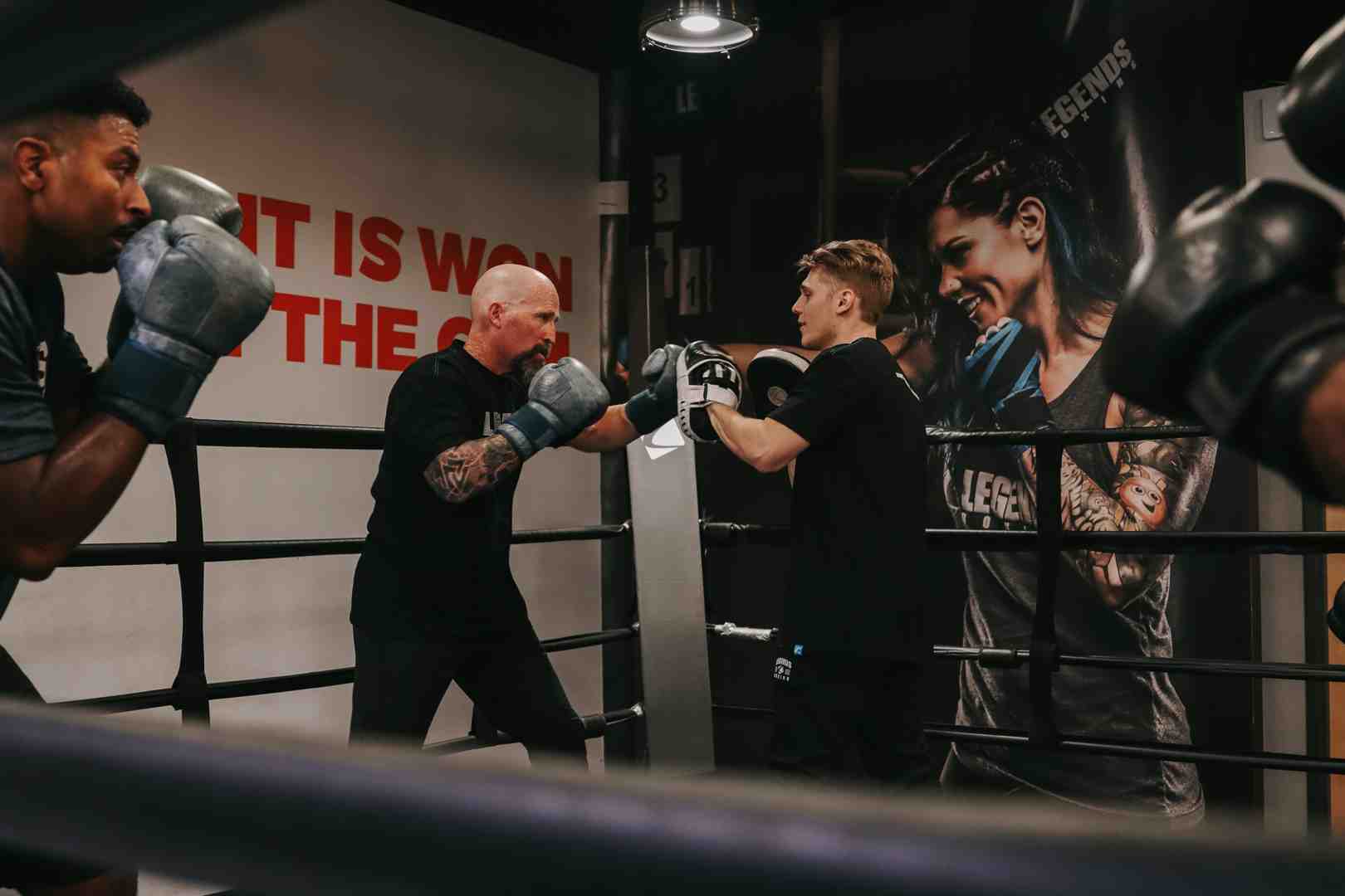 coach teaching proper punching form - boxing gym salt lake city