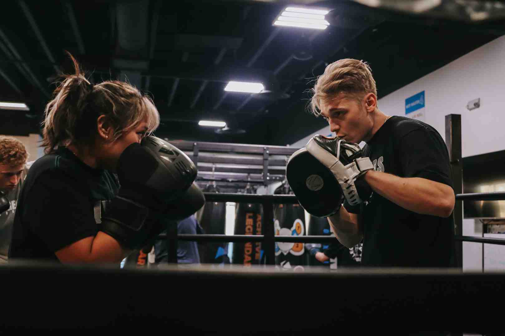 Boxer wearing large sparring gloves - biggest size boxing gloves