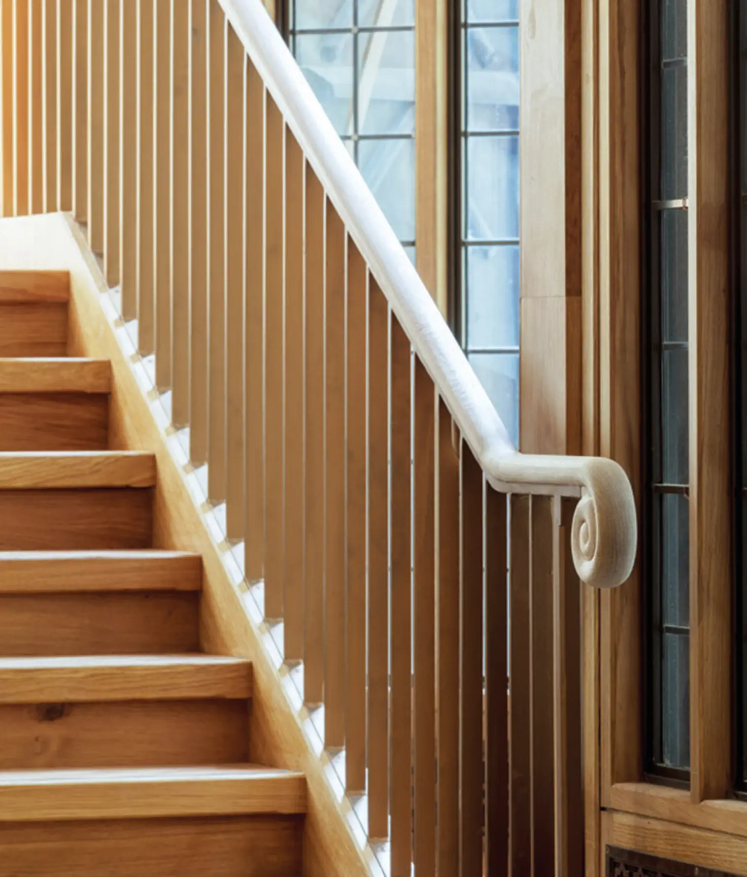 Precision crafted staircase and handrail