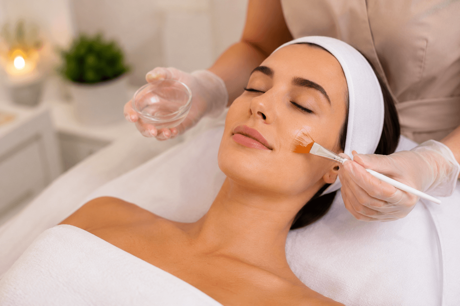 Patient receiving a professional chemical peel treatment in Cerritos, California to improve skin tone and texture