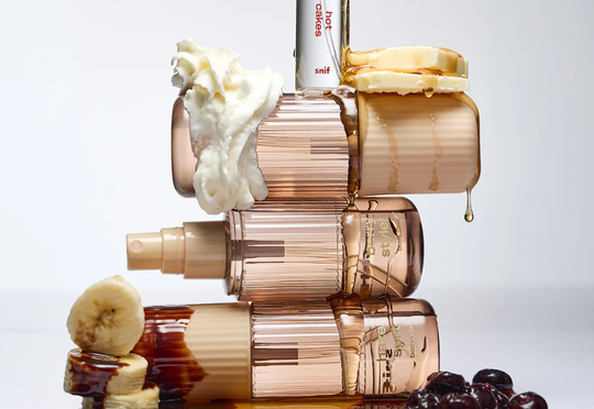 snif Hot Cakes maple perfume on a stack of pancakes dripping with butter, syrup and fruit