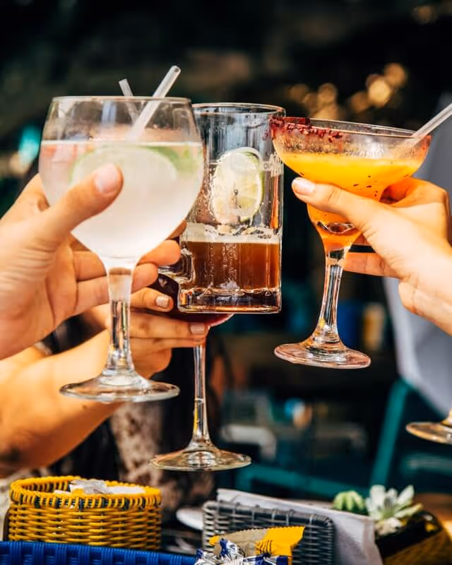 Number of drinks help up in a toast