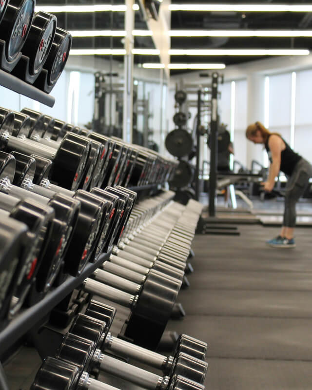 Close up of weights in a gym interior