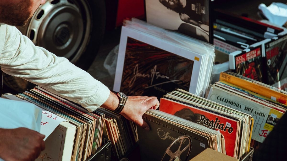 Man browsing record collection