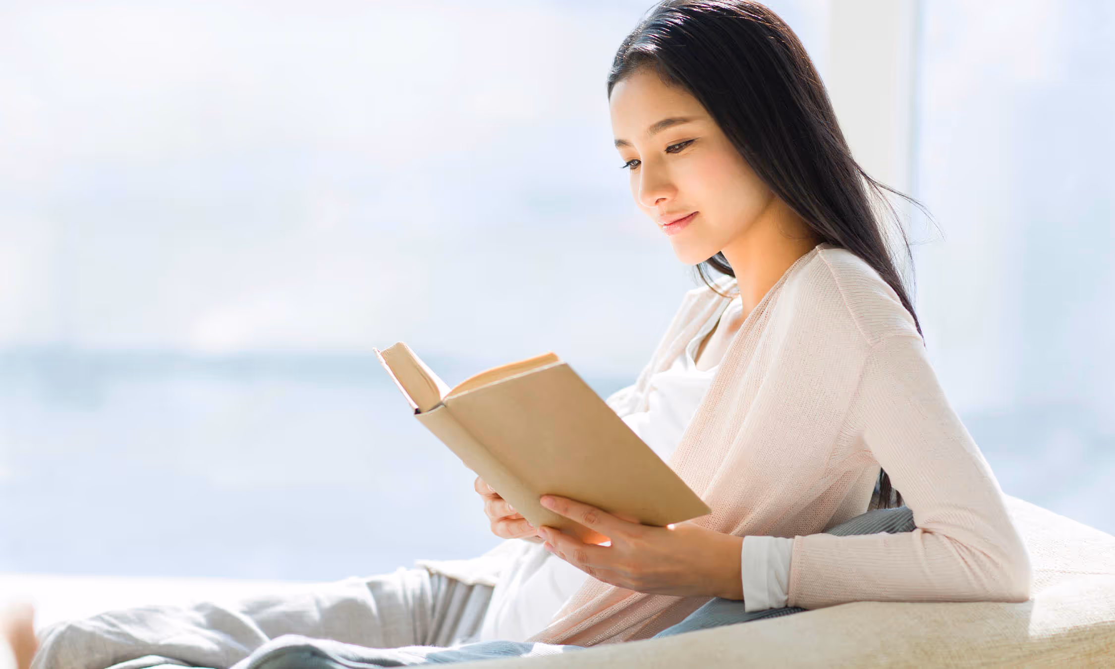 Female reading indoors