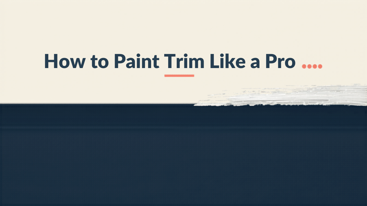 Close-up of a steady hand using an angled brush, showing how to paint trim with a crisp clean line on white baseboard.