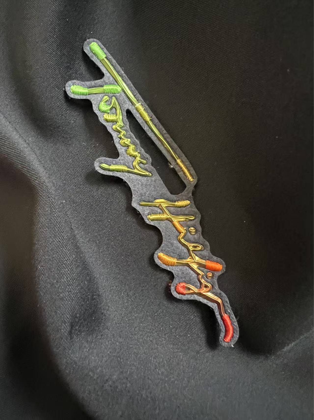 Patch applied to garment - J-Long