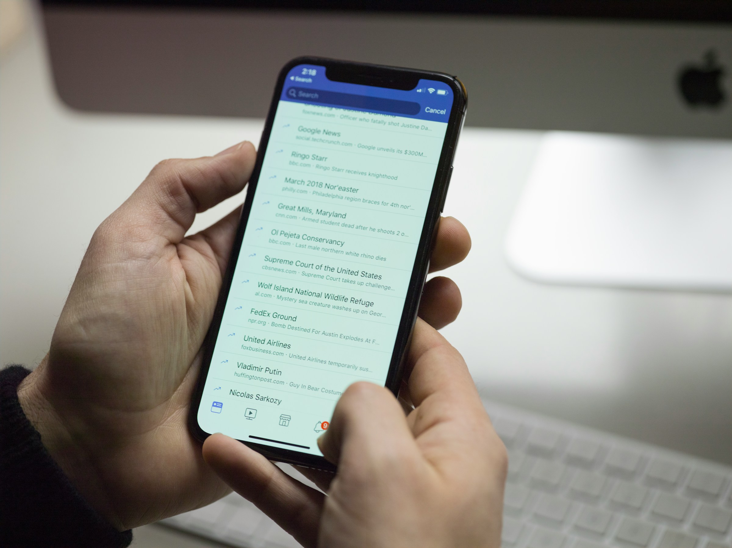 Man Using Phone - How to Format LinkedIn Posts